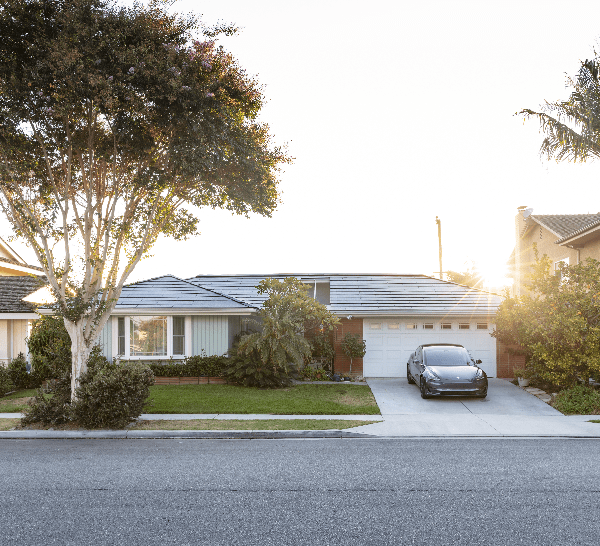 Gray house with Tesla Solar Roof