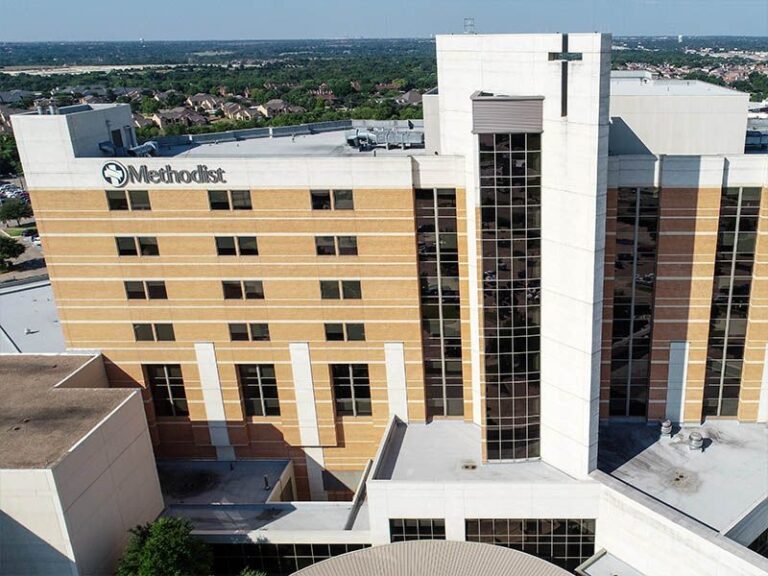 front of charlton methodist medical center with city background