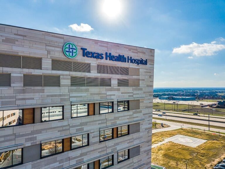 front of texas health hospital building with sign